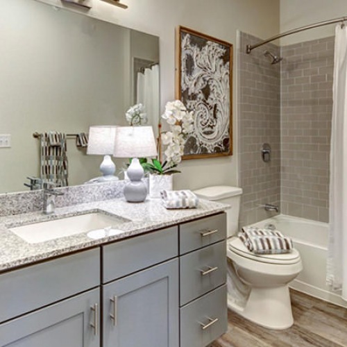 Spacious bathrooms with everything you need bright bathroom with shower/tub combo