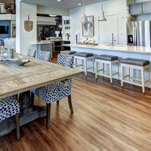 Enjoy our resident-only features chandeliers in clubhouse with kitchen and dining area